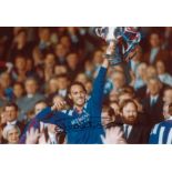 Football Autographed Mark Hateley 12 X 8 Photo Col, Depicting The Rangers Striker Holding Aloft