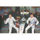 Mika Hakkinen and David Coulthard signed 11 x 8 inch colour photo. Good condition. All autographs