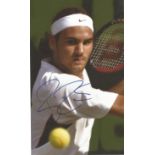 Roger Federer signed 10x6 colour photo. Good condition. All autographs come with a Certificate of