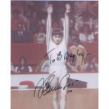 Nadia Comaneci signed 10 x 8 inch photo from the Montreal Olympics. Good condition. All autographs