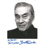 Burt Kwouk signed dedicated 6 x 4 b/w photo in very good condition with slight crease on bottom
