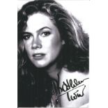 Kathleen Turner signed 6 x 4 b/w photo in very good condition with ding on a corner. All