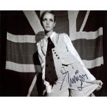 Twiggy. Stunning 8x10 photo signed by 1960 s fashion icon Twiggy pictured in her absolute prime!