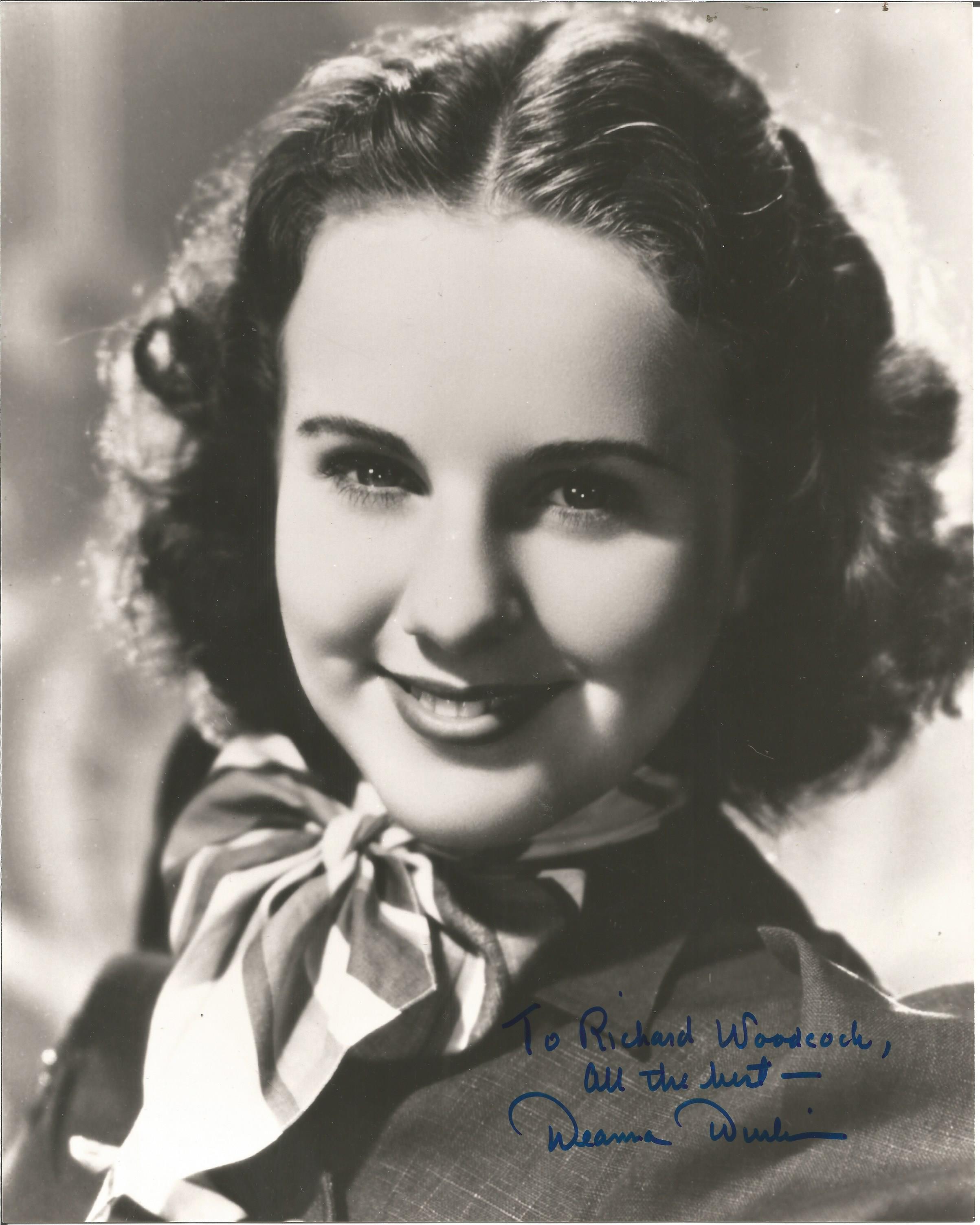 Deanna Durbin signed 10x8 black and white photo dedicated. Good condition. All autographs come