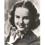 Deanna Durbin signed 10x8 black and white photo dedicated. Good condition. All autographs come