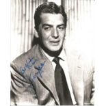 Victor Mature signed 10x8 black and white photo dedicated. Good condition. All autographs come