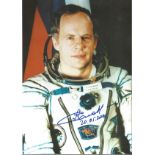 Cosmonaut A Solovyen signed 12 x 8 inch colour space suit photo. Good condition. All autographs come