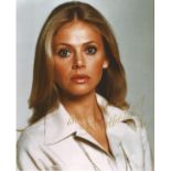 James Bond Britt Ekland signed 10 x 8 inch colour photo. Good condition. All autographs come with