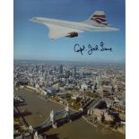 Concorde Chief Pilot 8x10 photo signed by Captain Jock Lowe. Good condition. All autographs come
