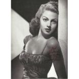 Lana Turner signed 10x8 black and white photo dedicated. Good condition. All autographs come with