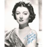 Myrna Loy signed 10x8 black and white photo dedicated. Good condition. All autographs come with a