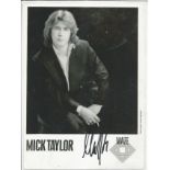 Mick Taylor signed 12x8 black and white photo. Good condition. All autographs come with a