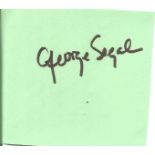George Segal signed album page. George Segal (February 13, 1934 - March 23, 2021) was an American
