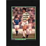 George McCluskey signed 16x12 overall mounted colour magazine photo pictured playing for Celtic.