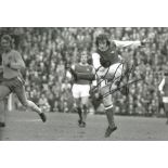 Football Liam Brady signed 12x8 black and white photo pictured in action for Arsenal. Good