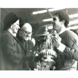 Football Ron Yeats signed 10x8 black and white photo pictured receiving the FA Cup while captain