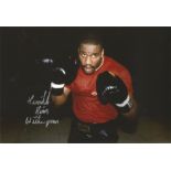 Boxing Tim Witherspoon signed 12x8 colour photo. Tim Witherspoon is an American former