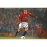 Phil Neville signed 12x8 colour photo pictured in action for Manchester United. Good condition.