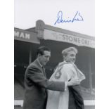 Autographed Denis Law 8 X 6 Photo - B/W, Depicting Manchester City Captain Ken Barnes Putting A