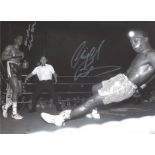 Boxing Michael Watson and Nigel Benn signed 16x12 black and white photo. Good condition. All