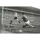 Football Cliff Jones signed 12x8 black and white photo pictured in goalscoring action for