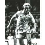 Terry Yorath signed 10x8 black and white photo pictured in action for Leeds United. Good