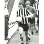 Bobby Moncur signed 10x8 black and white photo pictured leading Newcastle while Captain. Good