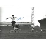 Football Alex Stepney signed 12x8 black and white photo pictured playing for Manchester United in