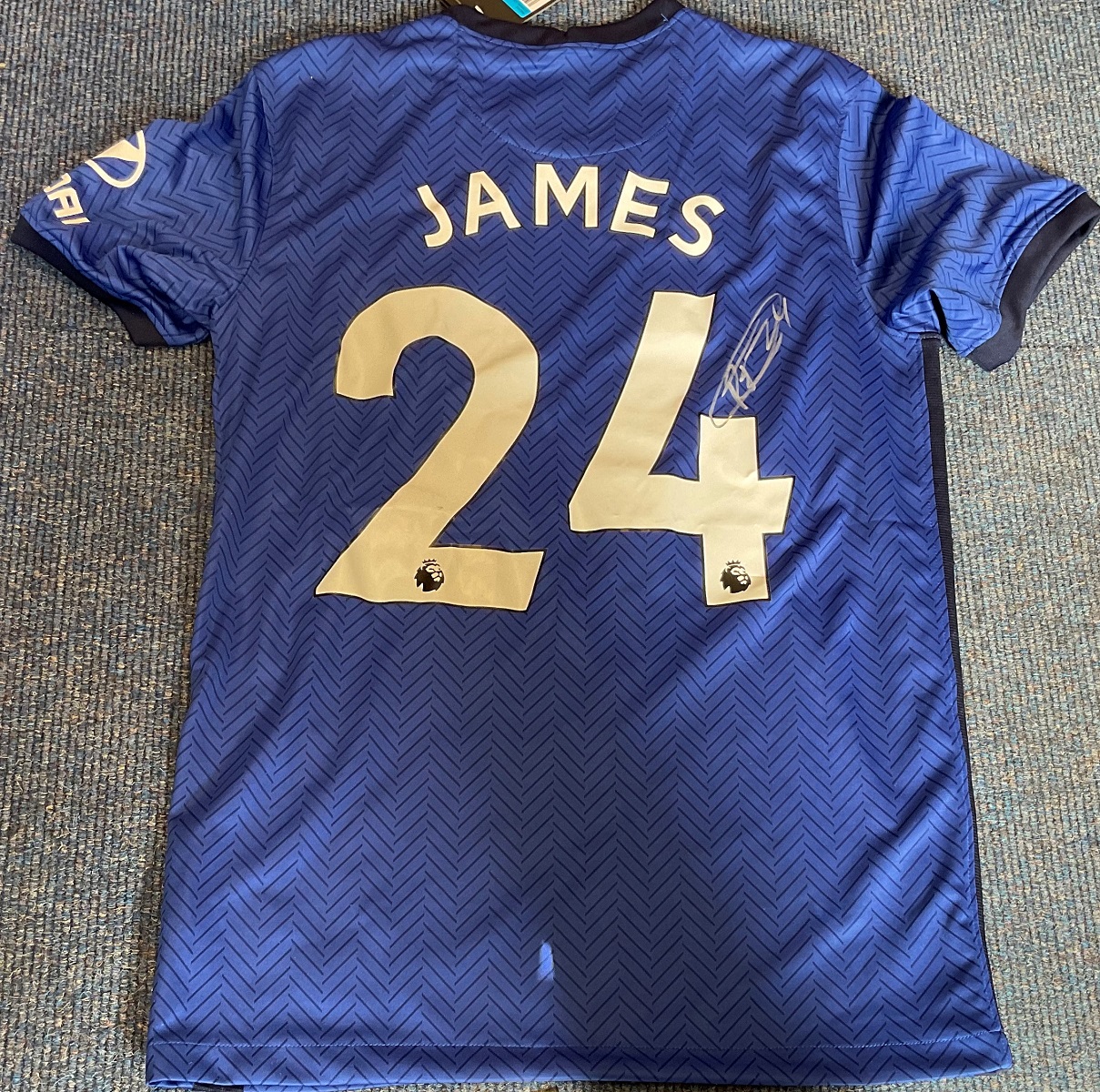 Football Reece James signed Chelsea replica home shirt signature on back. Size medium. Reece James