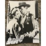 Grace Kelly signed 7 x 5 inch b/w Western movie irregular cut movie magazine photo. Condition 8/