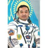 A. Aimbetov Kazakhstan Soyuz Cosmonaut signed 6 x 4 colour photo. Good condition. All autographs