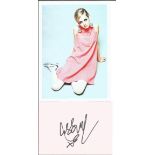 Supermodel Twiggy signature piece with colour photo. Good condition. All autographs come with a