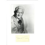 Spencer Tracy signature piece mounted below b/w photo. Approx overall size 14x11. Good condition.