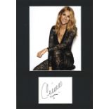 Celine Dion signature piece mounted below colour photo. Approx overall size 16x12. Good condition.