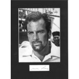 Maximillian Schell signature piece mounted below b/w photo. Approx overall size 13x10. Good