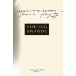 Signed hardback book, 'Visiting Rwanda' by Dervla Murphy. A clear signature is featured on the title