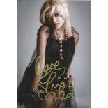 Pixie Lott signed 12x8 colour photo. Victoria Louise Pixie Lott (born 12 January 1991) is an English