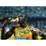 Usain Bolt signed 16x12 colour photo. Usain St Leo Bolt, OJ, CD born 21 August 1986) is a Jamaican