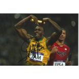 Usain Bolt signed 10x8 colour photo. Usain St Leo Bolt, OJ, CD born 21 August 1986) is a Jamaican