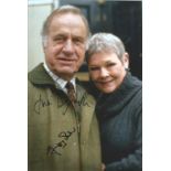 Judi Dench and Geoffrey Palmer signed 10x8 colour photo. Good condition. All autographs come with