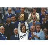 Franz Beckenbauer signed 12x8 colour photo pictured lifting the world cup for West Germany in