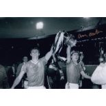 Autographed Arthur Albiston 12 X 8 Photo - B/W, Depicting Albiston And His Man United Team Mate