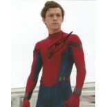 Tom Holland signed 10x8 colour Spiderman photo. Good condition. All autographs come with a