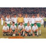 Autographed Kevin Moran 12 X 8 Photo Colour, Depicting Moran And His Irish Team Mates Posing For A