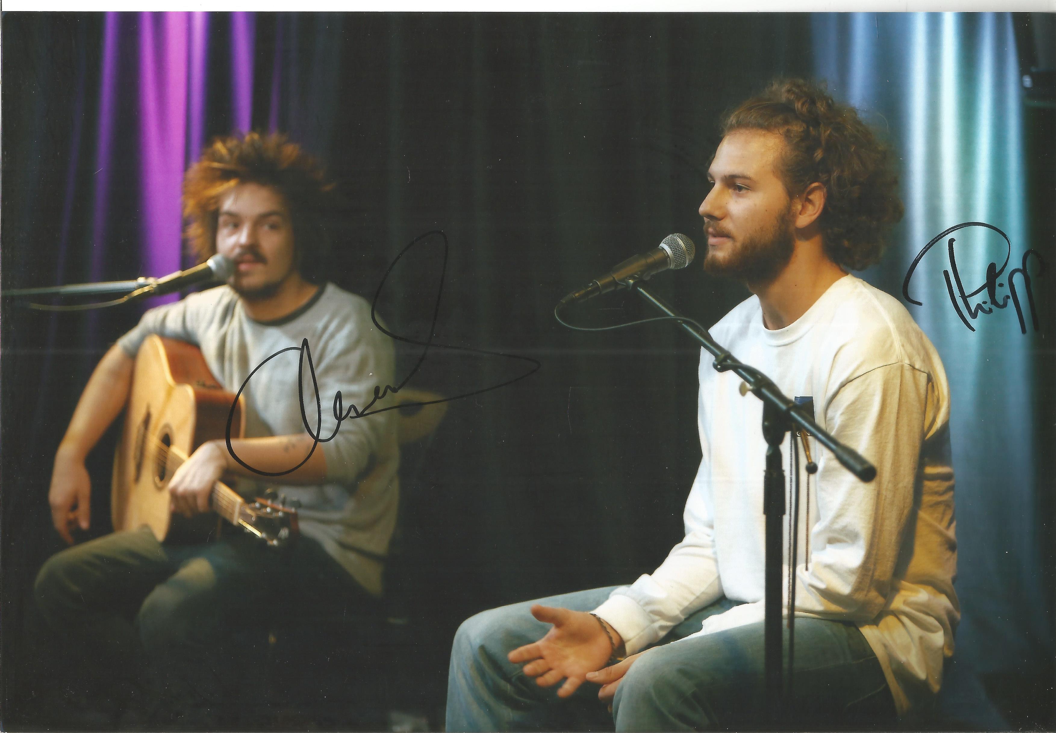 Milky Chance Signed 12 x 8 inch music photo. Good Condition. All autographs come with a. Good