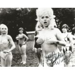 Dame Barbara Windsor signed 10x8 black and white photograph pictured during her time playing in