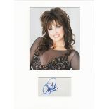 Marie Osmond signed card piece. Photo attached. 16 x 12. Good condition. All autographs come with