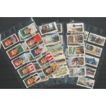 WD and HO Wills cigarette card collection on 15 album leaves. Includes 1935 association