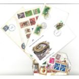 Commonwealth collection includes stamps from South Africa, 2 FDC Tuvalu and Bermuda and FDI Wales