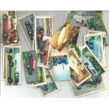 Cigarette card collection. Includes Lyons maid 1966 famous cars 38 cards, The molassme co 1964 - dog